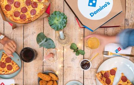 table with Dominos pizza